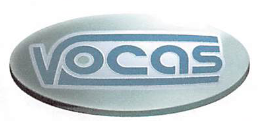 Oval logo with the text "vocas" in reflective metallic blue and silver design on a white background.